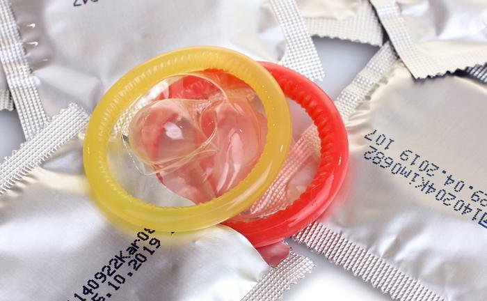 Can AIDS be avoided if we use condoms or contraceptive sheath?