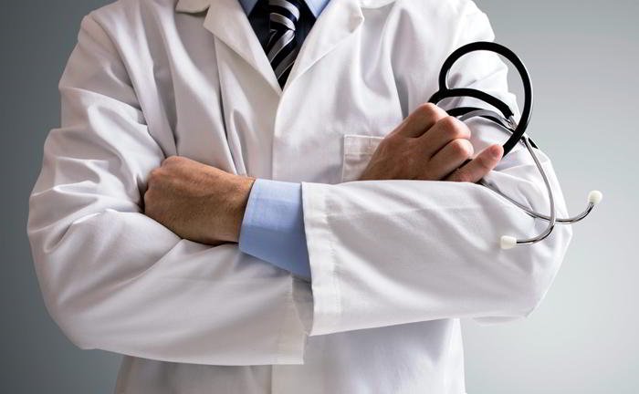 Do insurance companies have their own doctors?