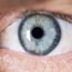 My mother often gets black spot in front of her left eyes. What can be the reason?