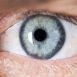 My mother often gets black spot in front of her left eyes. What can be the reason?