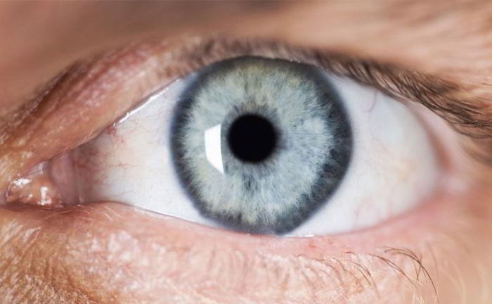 My mother often gets black spot in front of her left eyes. What can be the reason?