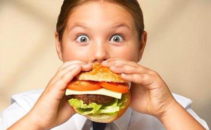 My stomach is as hard as a rock after I take my meals. Why is it so?