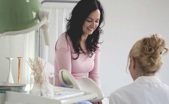 What are symptoms and treatment for cervical erosion?