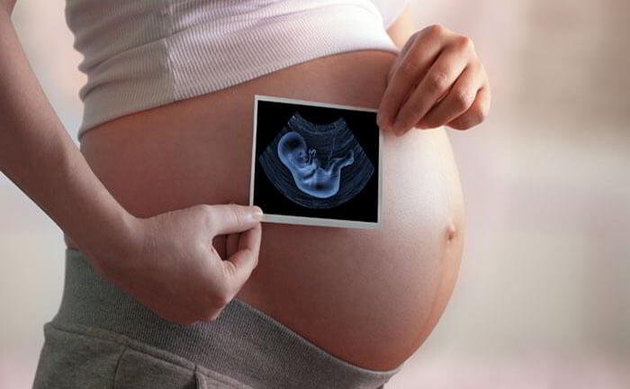 What is the difference between abortion and miscarriage?